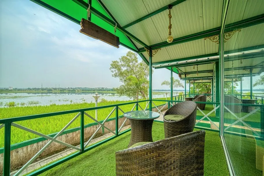 Outdoor sit-out with peaceful nature views at The Herb Farm Resort