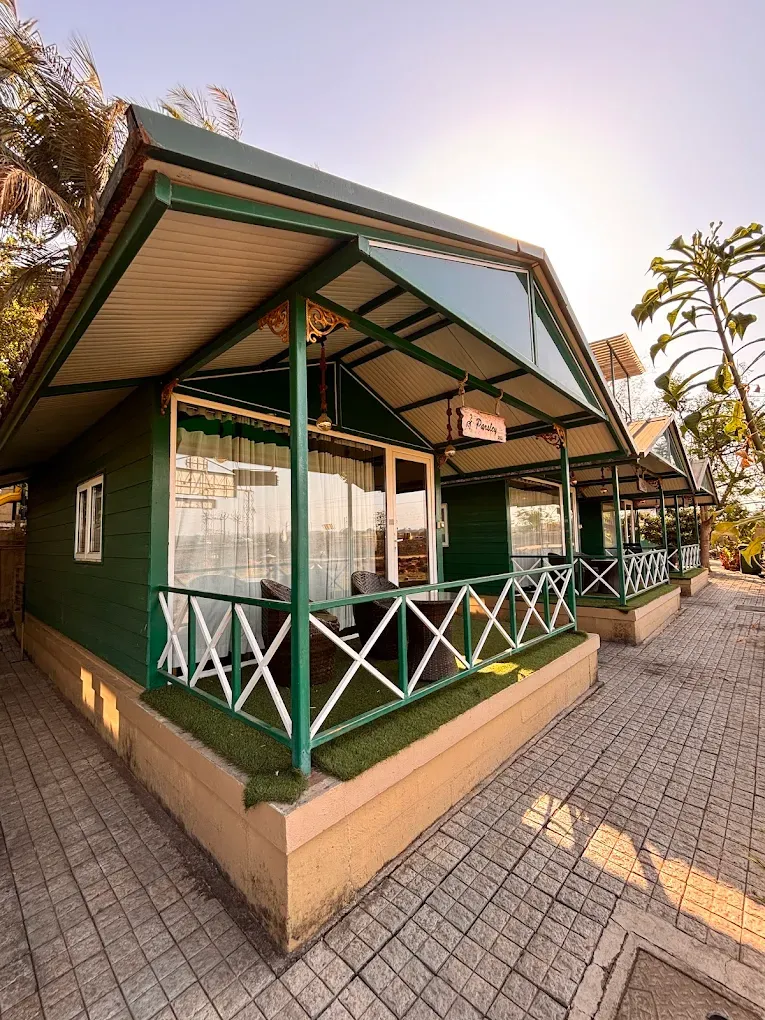 Premium lakeside cottage surrounded by greenery at The Herb Farm Resort, Igatpuri